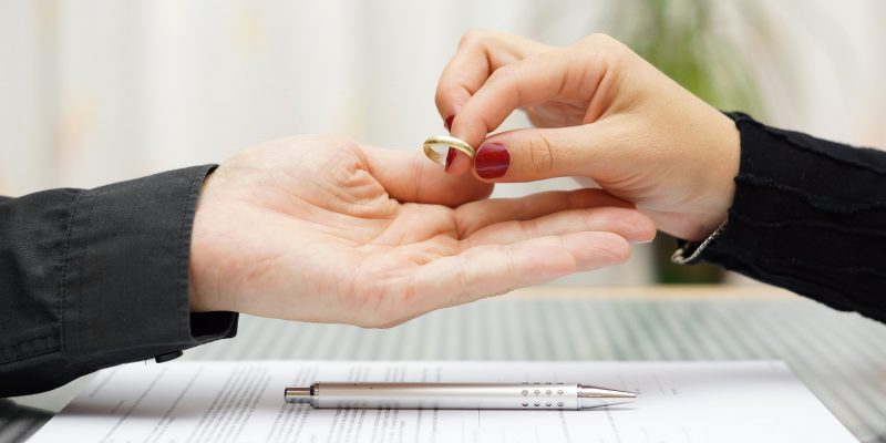 woman returned wedding ring to husband . Divorce concept woman returned wedding ring to husband . Divorce concept